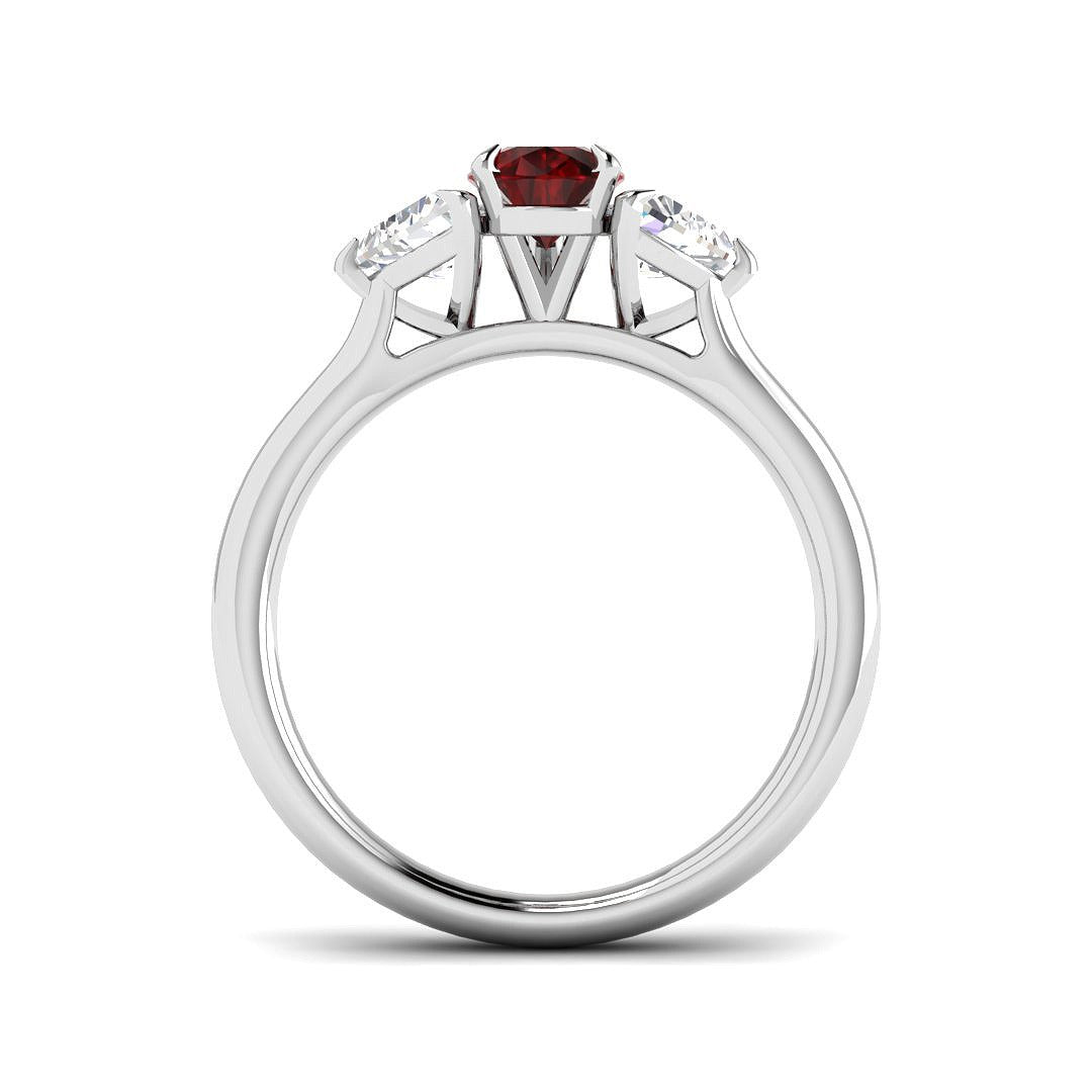 Ruby Trilogy Ring with Pear Cut Ruby & Trillion Diamond Side Stones in 10K/14K gold and platinum with certified lab-grown or natural diamonds