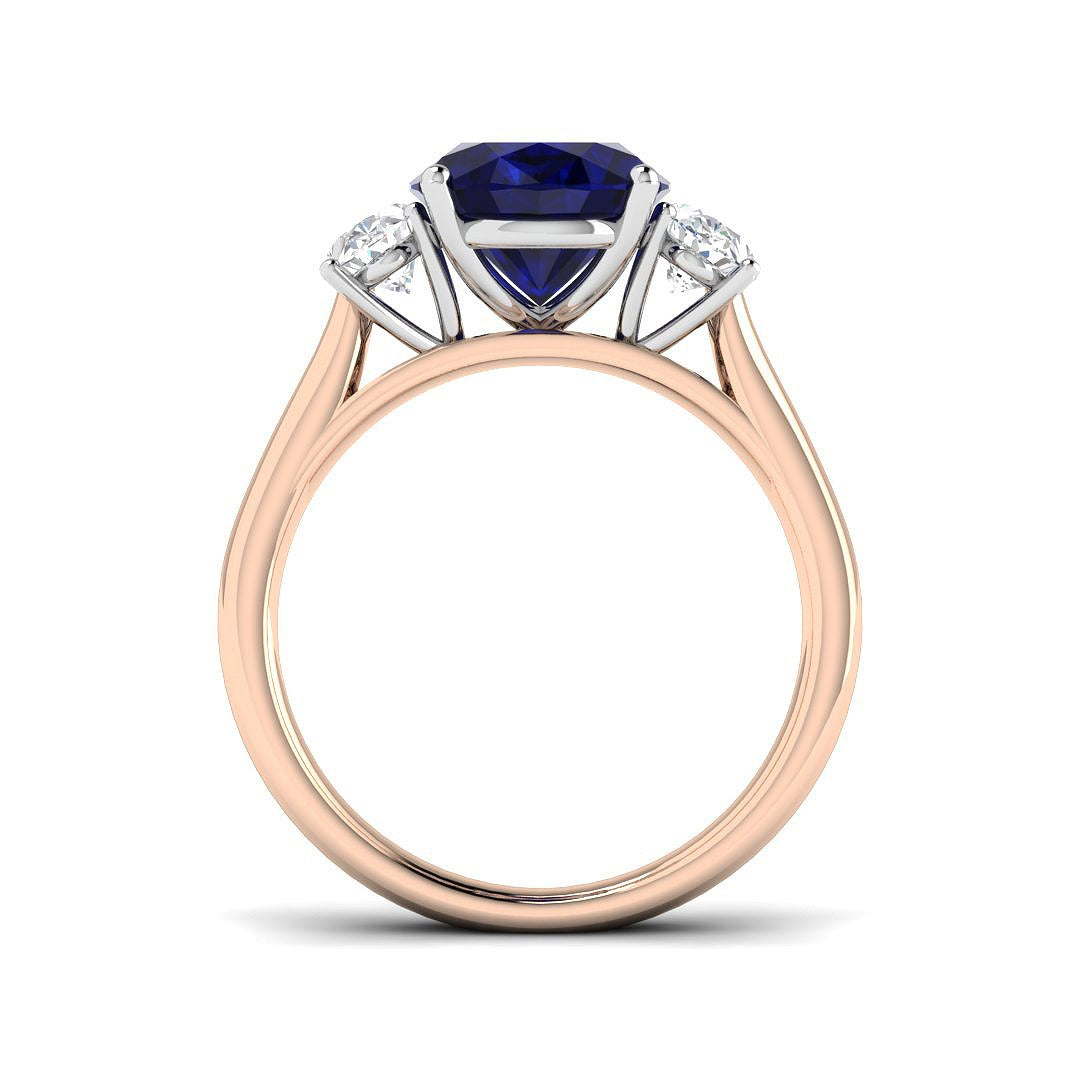 Natural Oval Cut Blue Sapphire with Side Stone Ring in Prong Set in 10K/14K gold and platinum with certified lab-grown or natural diamonds