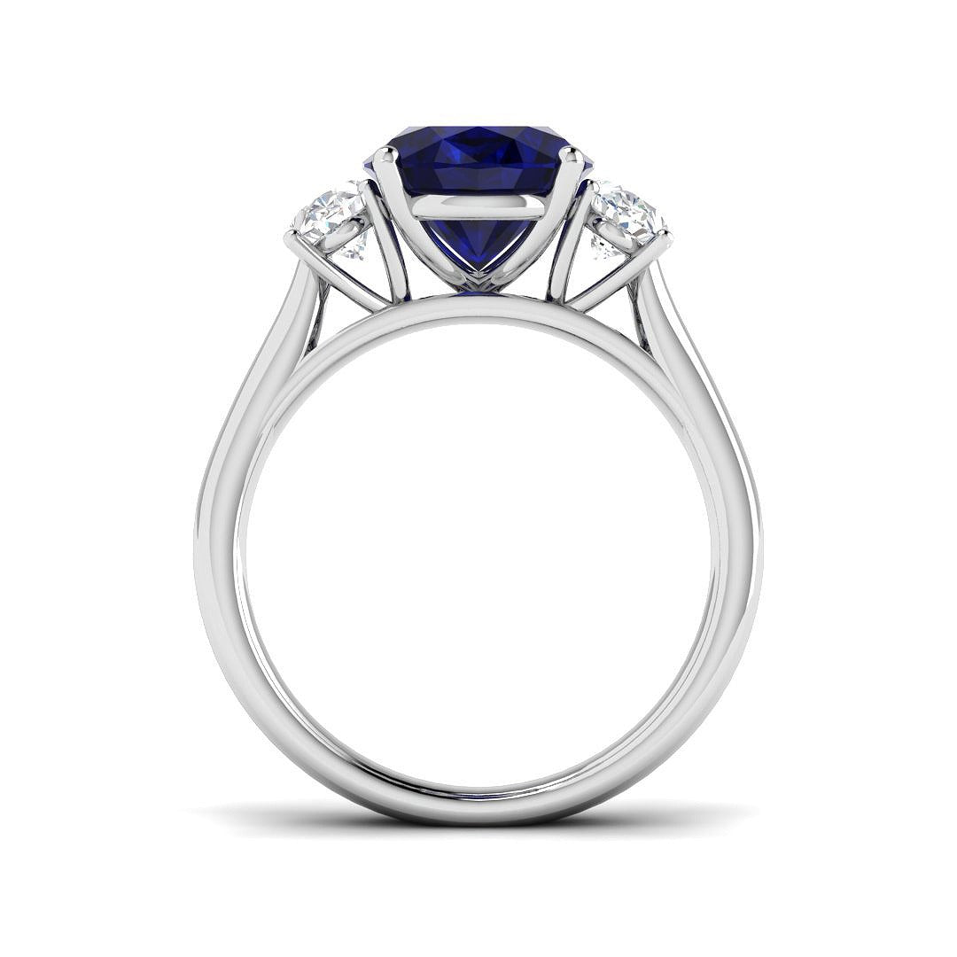 Natural Oval Cut Blue Sapphire with Side Stone Ring in Prong Set in 10K/14K gold and platinum with certified lab-grown or natural diamonds