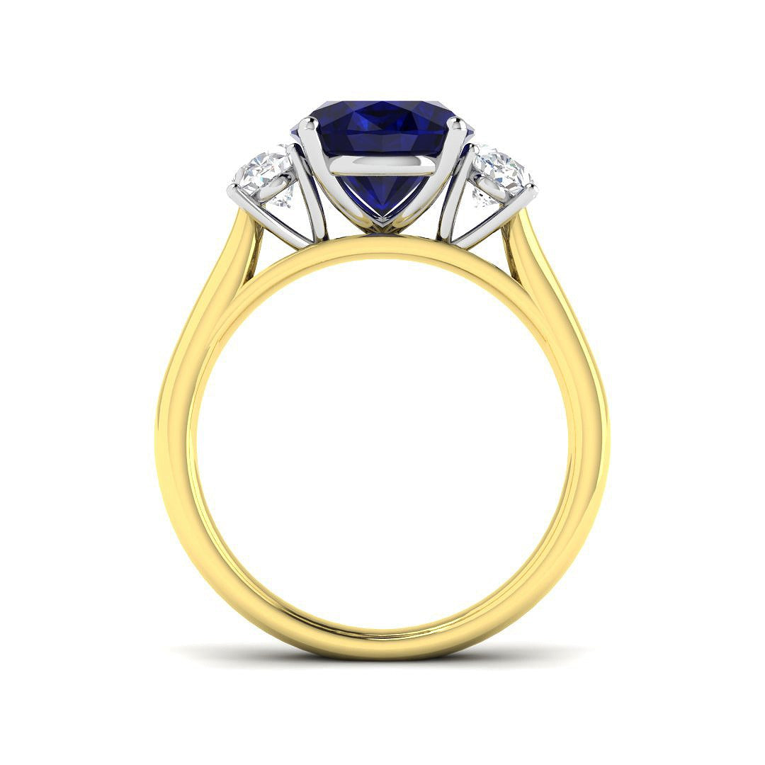 Natural Oval Cut Blue Sapphire with Side Stone Ring in Prong Set in 10K/14K gold and platinum with certified lab-grown or natural diamonds