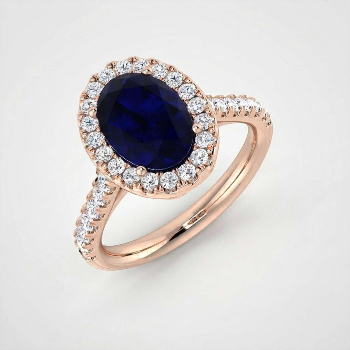 Oval Blue Sapphire Halo Ring with Pave Natural Diamond Band in 10K/14K gold and platinum with certified lab-grown or natural diamonds