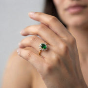 Oval Green Emerald Halo Engagement Ring with Natural Diamond Cluster in 10K/14K gold and platinum with certified lab-grown or natural diamonds