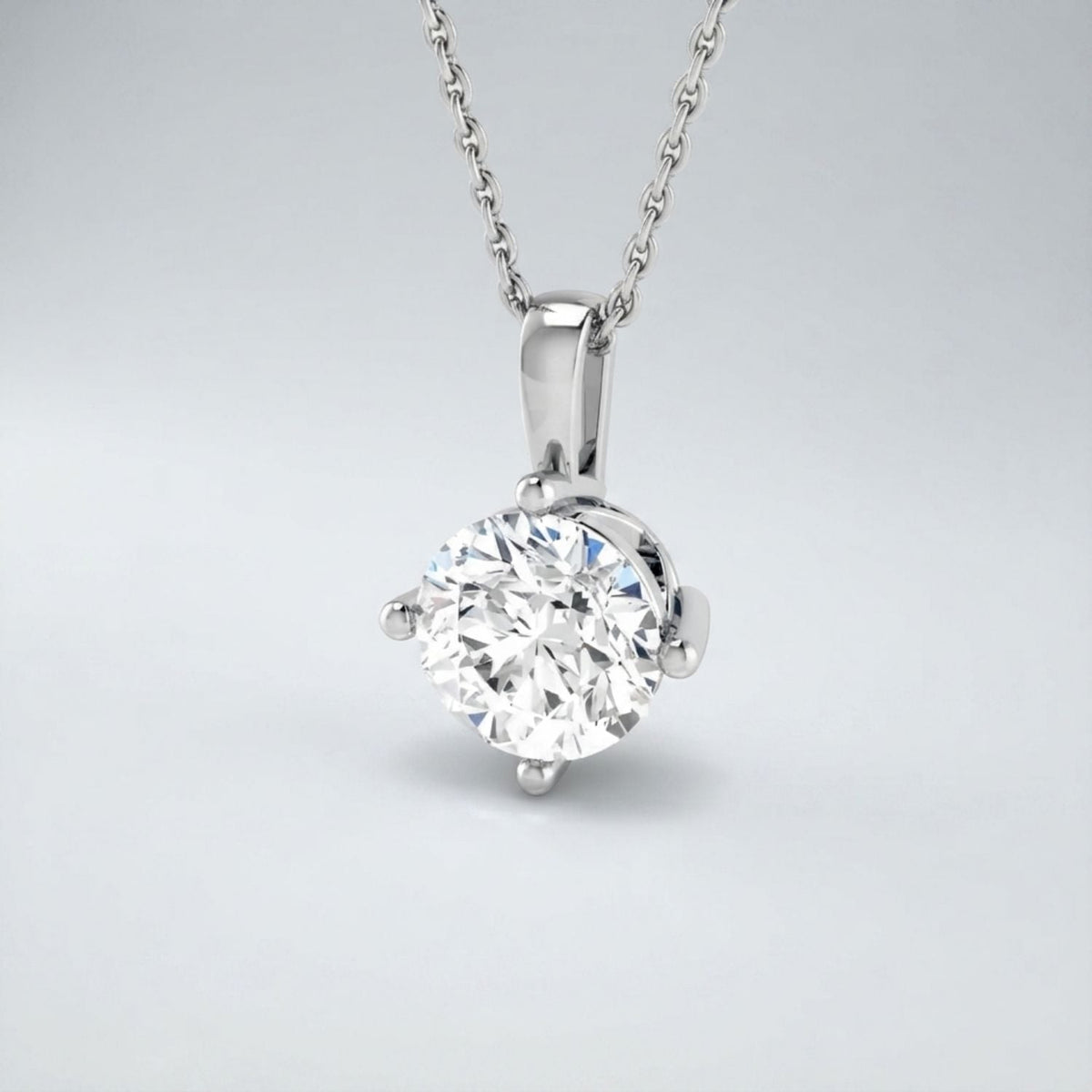 Round Diamond Solitaire Pendant in 10K/14K gold and platinum with certified lab-grown or natural diamonds